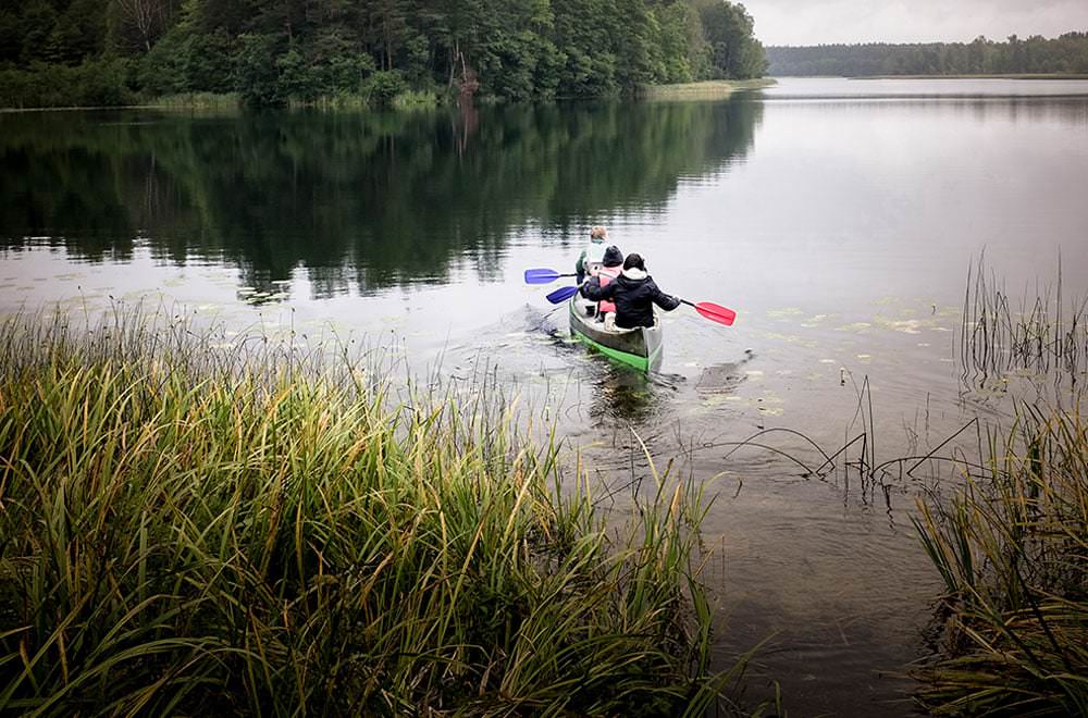 Image of conoeing in lake in Paluse, Lithuania